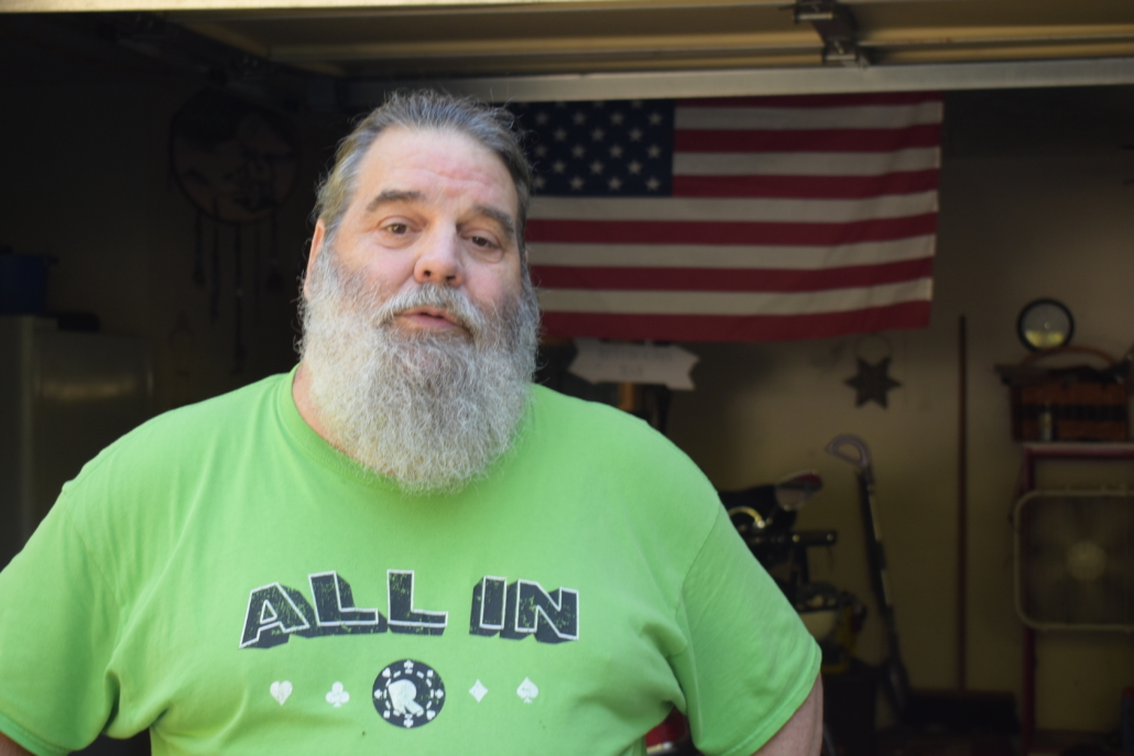 Air Force Veteran Glenn Clontz in front of his home